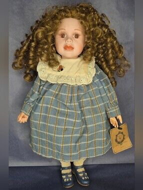 Vintage-Style Porcelain Doll with Blue Plaid Dress